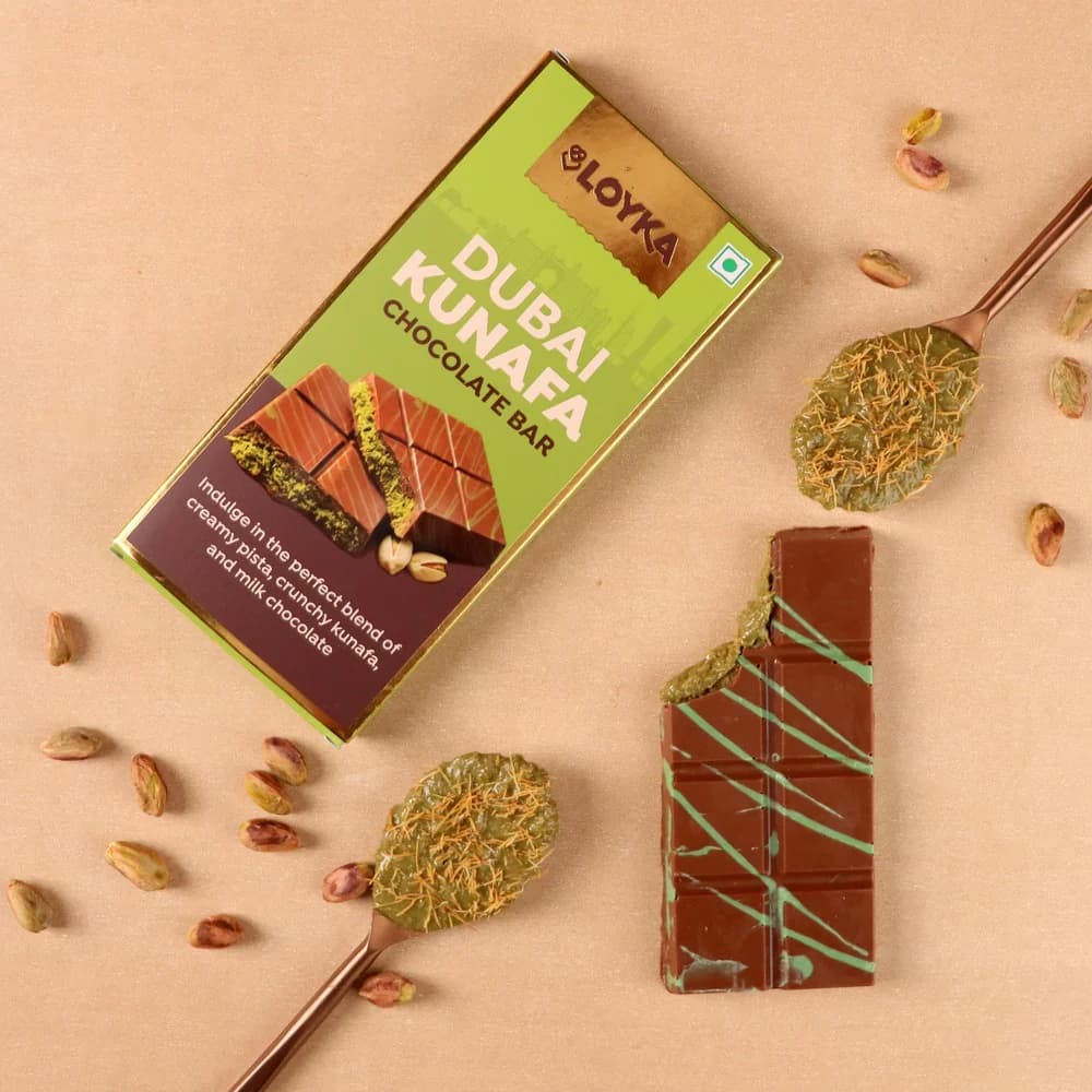 L'Elite du Chocolat - Découvrez notre iconique chocolat à la pistache et kunafa, une expérience sensorielle inoubliable. - Abou Family